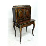 A 19th century boulle work side cabinet of serpentine outline, on cabriole supports,