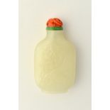 A Chinese white jade snuff bottle, 20th century, of flattened rounded rectangular form,