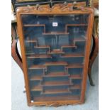 A pair of 20th century Chinese hardwood hanging display cabinets, 50cm wide x 85cm high.