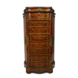 An early 20th century French gilt metal mounted kingwood marble top secretaire of semainier form,