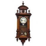 A walnut cased Vienna style wall clock, early 20th century,