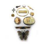 A Masonic ball folding pendant, opening to reveal engraved Masonic symbols, a gold bar brooch,