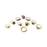 A 9ct gold, garnet and colourless gem set cluster ring, a 9ct gold ring,