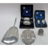 Silver and silver mounted wares, comprising; a pair of twin handled boat shaped salts,