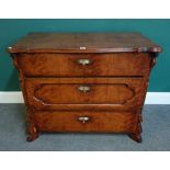 An 18th century Continental style stained birch commode with shaped top over three drawers,