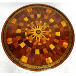 A Regency circular table top,