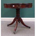 A small George III mahogany drum table on four downswept supports, 78cm wide x 71cm high.