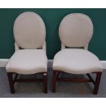 A set of fifteen George II style oval back dining chairs on square supports.