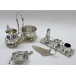 A silver tea strainer, with floral embossed decoration, in an Art Nouveau design, Birmingham 1905,