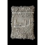 A Victorian silver 'castle top' card case of shaped rectangular form,