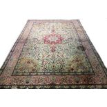 A part silk modern Chinese carpet, the sage field with a madder faceted medallion,
