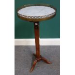 A 19th century French fruitwood marble topped height adjustable tripod table, 33cm wide.