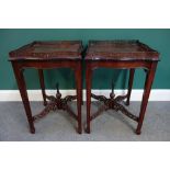 A pair of 18th century style mahogany pierced tray top square side tables of serpentine outline,