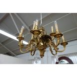 A Georgian style gilt bronze twelve branch chandelier, 20th century,