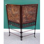 A George III mahogany fret pierced two fold screen, 100cm wide 112cm high.