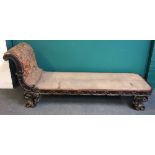 A 19th century Italian carved walnut chaise longue on scroll feet, 220cm wide x 86cm high.