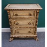 An 18th century style Italian polychrome painted and carved three drawer chest, on carved paw feet,