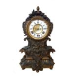 A Continental bronzed metal mounted clock, late 19th century/early 20th century,