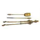Two sets of brass and steel fire implements.
