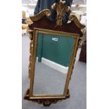 A George I style parcel gilt walnut pier glass with Prince of Wales feather crest,