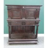 An Italian walnut cabinet on stand, of 19th century construction utilising earlier components,