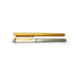 A Dunhill gold plated fountain pen, with banded decoration,