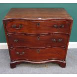 A George III mahogany serpentine chest of three long graduated drawers, on bracket feet,