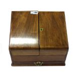 A Victorian walnut slope front two door stationery box, with fitted interior, 39cm x 33cm.