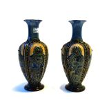 A pair of Doulton Lambeth stoneware vases, dated 1883,