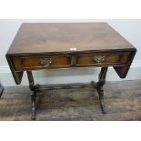 A reproduction Regency style mahogany and banded sofa table,