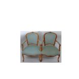 A pair of reproduction Louis XV style ca