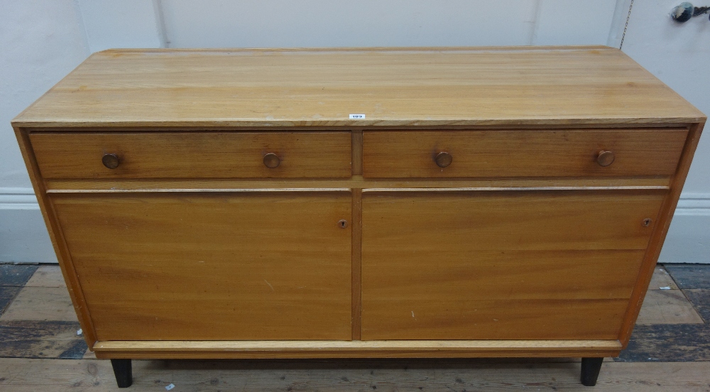 A mid 20th century sideboard with two fr
