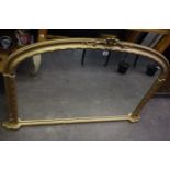 A reproduction Victorian style arched gilt frame overmantel mirror, by John Lewis, 130cm wide.