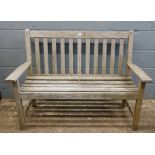 A slatted wooden garden bench seat, 128cm wide.