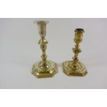 A mid 18th century brass candlestick, of