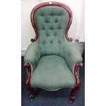 A Victorian mahogany spoon back armchair