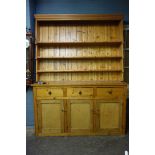 A large Victorian and later waxed pine d