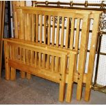 A pair of 20th century oak single beds (2).