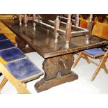 A large 20th century oak refectory style dining table, 220cm wide.