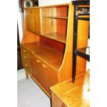 A 20th century teak side unit with pair of glazed doors and and arrangement of cupboards,