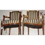 A pair of 19th century walnut blue and yellow upholstered fauteuils (2).