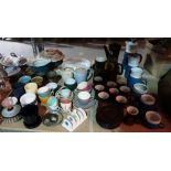 A quantity of 20th century Denby and Poole pottery, including tea sets, vases and sundry (qty).