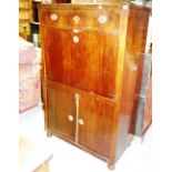 A Biedermeier walnut secretaire, with fitted interior and cupboard base, 89cm wide x 142cm high.