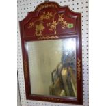 An Oriental red lacquer wall mirror, 41cm wide.