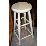 A set of four 20th century white painted bar stools.