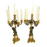 A pair of French ormolu and marble mounted figural five branch candelabra, early 20th century,