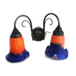 A pair of orange and blue coloured glass dished ceiling lights in gilt wrought iron frames,