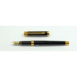 A Montblanc Noblesse black and gilt fountain pen with 18ct nib.