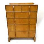 A golden oak six drawer chest, by Peter Waals after a design by Ernest Gimson, circa 1930,