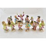 Ten Volkstadt porcelain monkey band musicians, including the conductor,